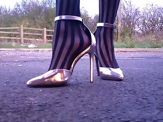 HD, Transexuales Silver heels walking (floor view).MP4